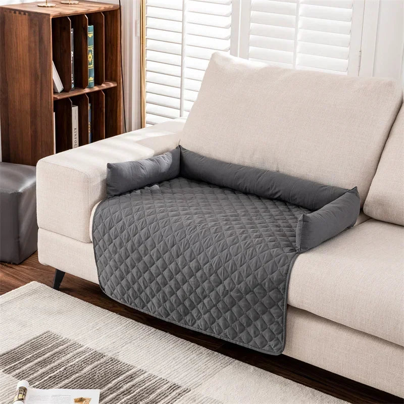 Gray waterproof dog blanket featuring a non-slip base, made from eco-friendly fabric. Ideal for pet owners, it provides comfort and protection for furniture while keeping 8