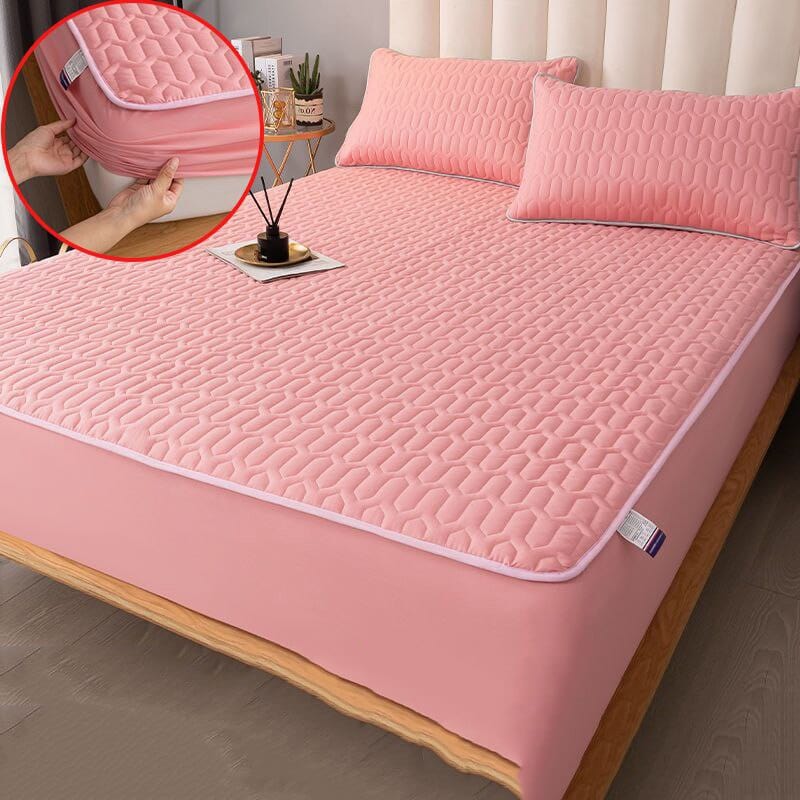 Waterproof queen mattress protector featuring a soft knotted design for added comfort. Made from durable, breathable fabric that keeps your mattress safe from spills and stains 4