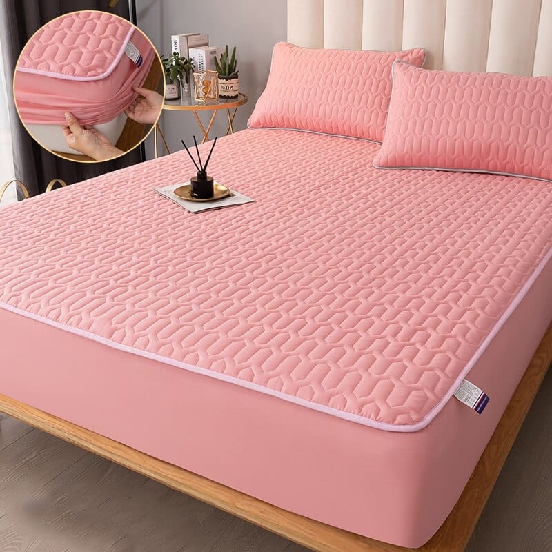 Queen-sized waterproof mattress protector featuring a soft knotted design for added comfort. Made from durable, breathable material in a subtle, neutral color, it ensures 9