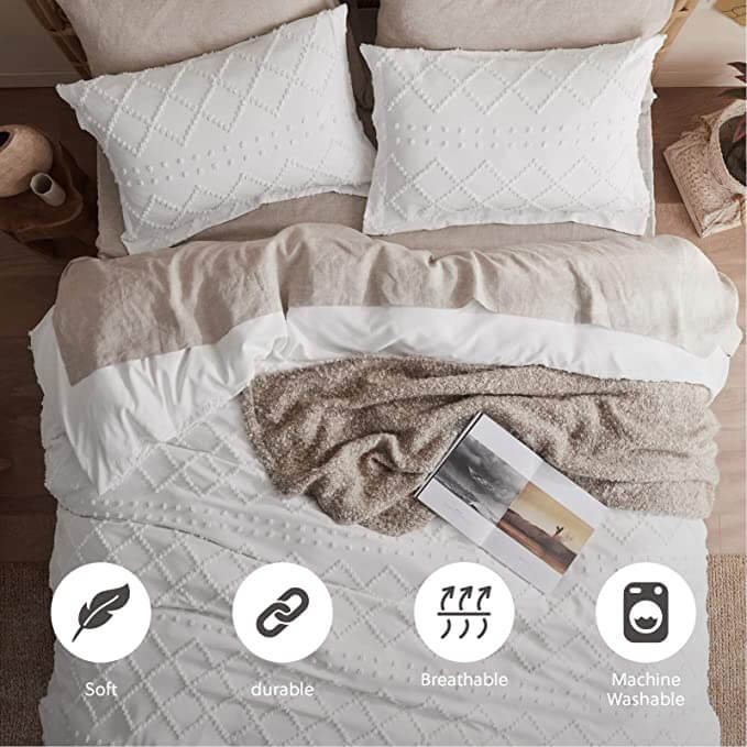 White cotton duvet cover set featuring a soft waffle texture, designed for both King and Queen sizes. The set adds a cozy and modern touch to any bedroom 1