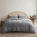 White cotton duvet cover set featuring a soft waffle texture, designed for both King and Queen sizes. The set adds a cozy and modern touch to any bedroom 4