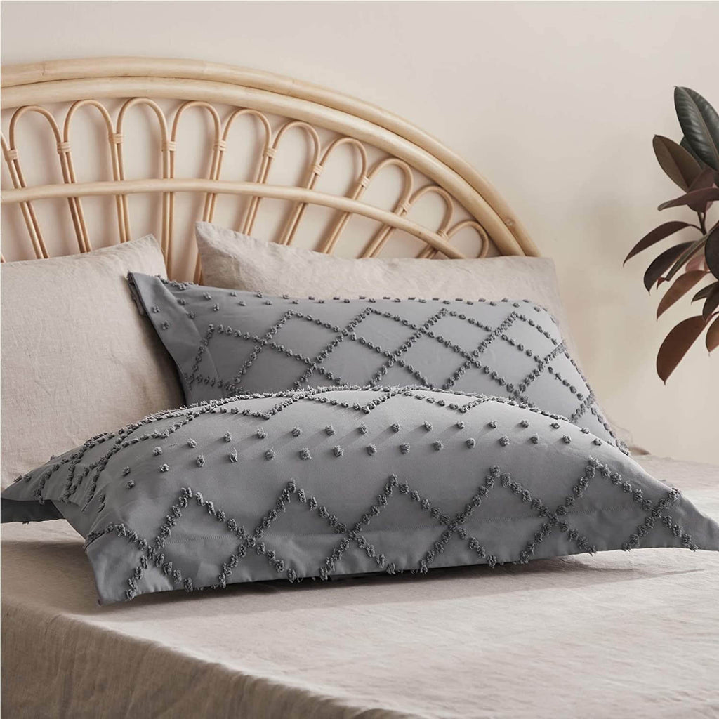 White cotton duvet cover set featuring a soft waffle texture, designed for both King and Queen sizes. The set adds a cozy and modern touch to any bedroom 5