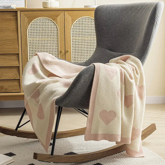 Cozy sofa blanket with heart pattern