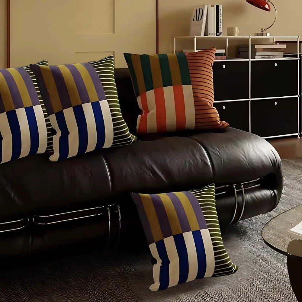 Dear Hazel Mod Blocks striped cushion cover in microfiber blend with invisible zipper. Features bold stripes in blue, white, purple, and olive green.