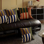 Dear Hazel Mod Blocks striped cushion cover in microfiber blend with invisible zipper. Features bold stripes in blue, white, purple, and olive green.