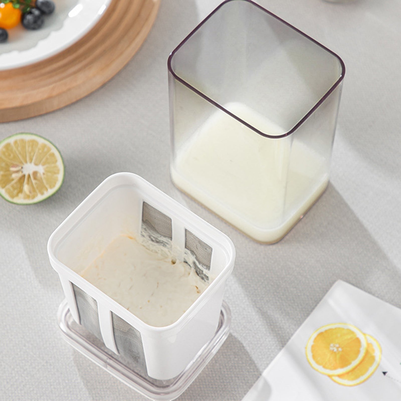 Dear Hazel white yogurt strainer with stainless steel mesh, for making Greek yogurt, cheese, and sauces.