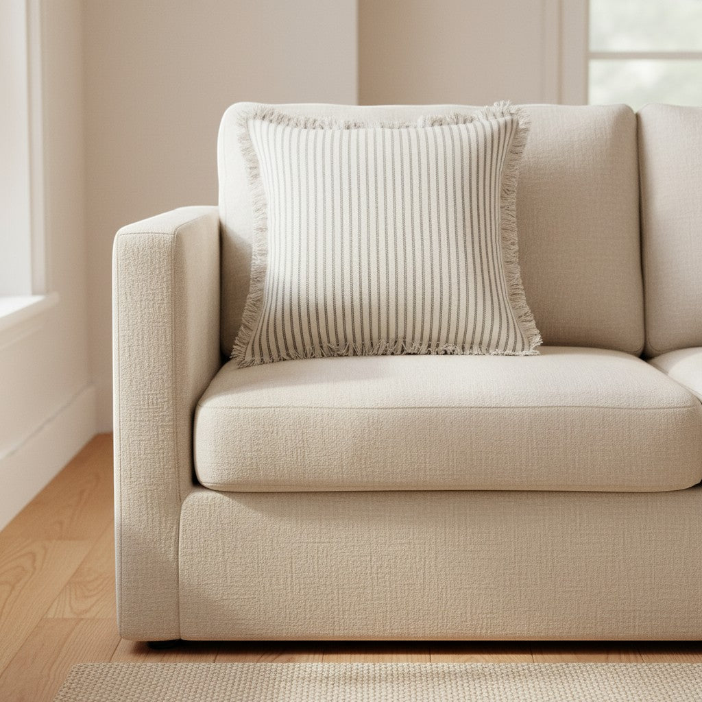Dear Hazel Scandi-style striped cushion cover in cotton-linen blend with fringed edges, 18x18 inches.